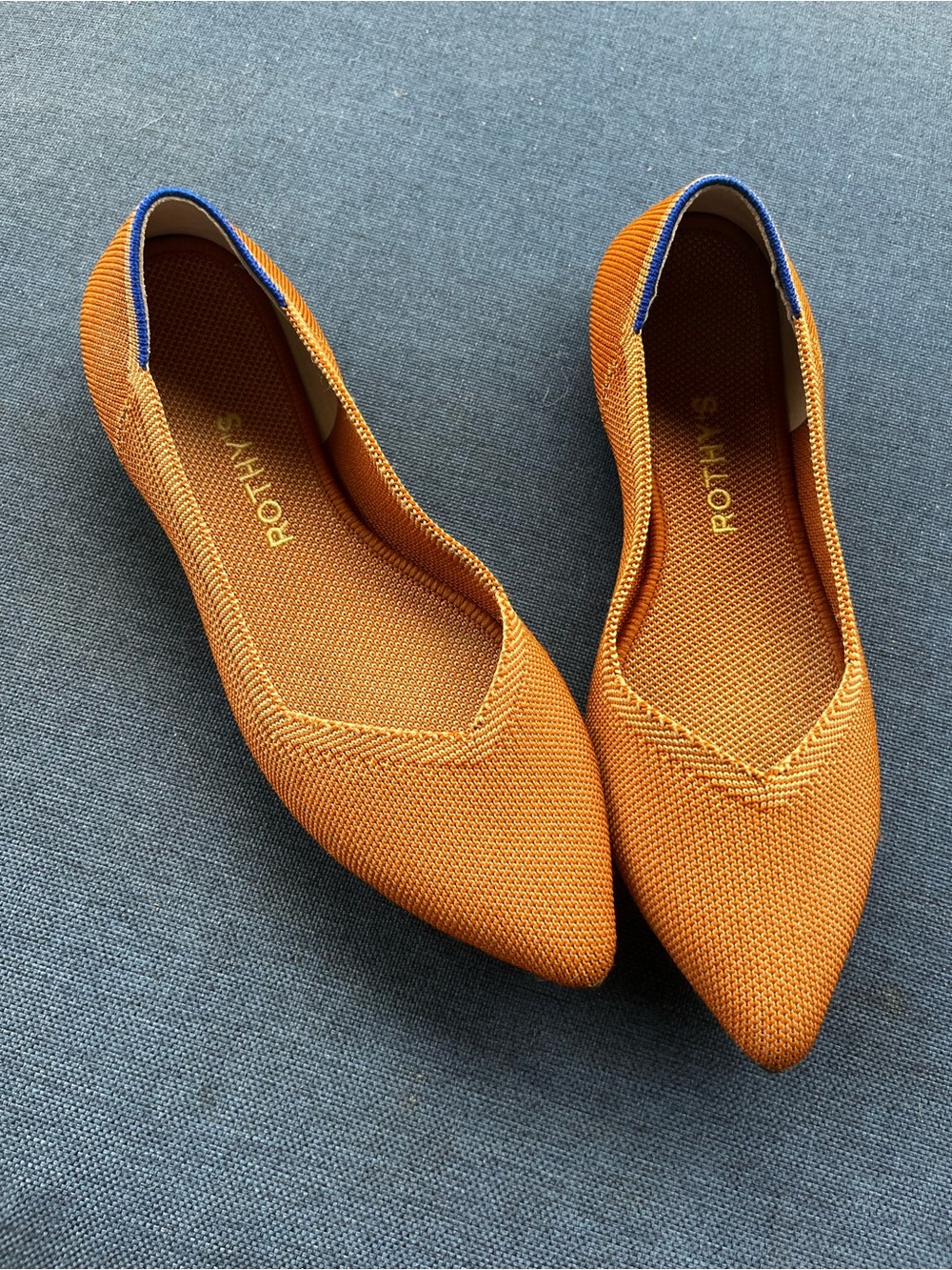 Rothy's Pointed Knit Flats in Orange with Blue Trim